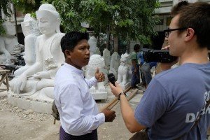Max Efrein interviewing a tour guide in Mandalay, Myanmar.