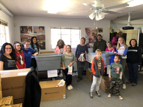 Volunteers Stuff 1,860 Smile Bags for Esperança’s Oral Health Program